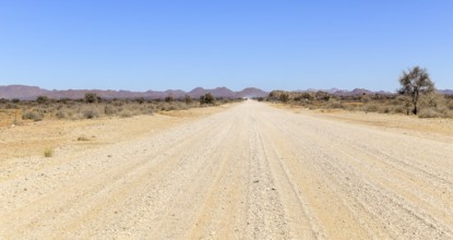 Abandoned area with dusty dirt road in Namibia