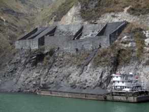 Chinese cargo ship and gravel distribution at yangtze river