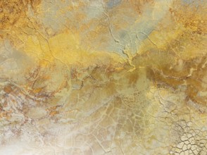 Abstract patterns in a waste pond in the mineral-rich area of the Rio Tinto mines. The colour is