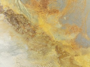 Abstract patterns in a waste pond in the mineral-rich area of the Rio Tinto mines. The colour is