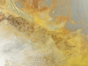 Abstract patterns in a waste pond in the mineral-rich area of the Rio Tinto mines. The colour is