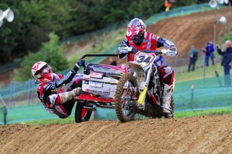 Motocross, Rudersberg, Baden-Württemberg, Germany, Europe, Double team on a motorbike rides over a