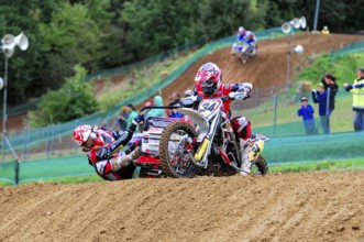 Motocross, Rudersberg, Baden-Württemberg, Germany, Europe, A motorbike rider with passenger rides