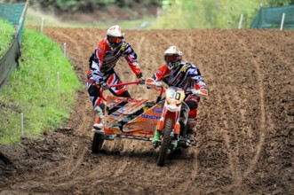 Motocross, Rudersberg, Baden-Württemberg, Germany, Europe, Sidecar motorbike riders ride through a