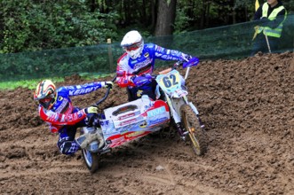 Motocross, Rudersberg, Baden-Württemberg, Germany, Europe, Rider fights his way through a muddy