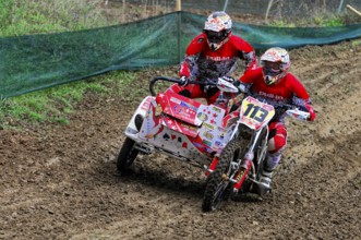 Motocross, Rudersberg, Baden-Württemberg, Germany, Europe, Rider duo in full speed through muddy