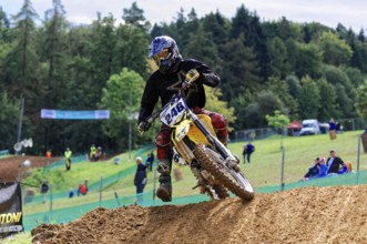 Motocross, Rudersberg, Baden-Württemberg, Germany, Europe, Rider on motorbike in fast ride on