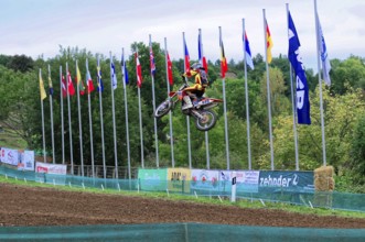 Motocross, Rudersberg, Baden-Württemberg, Germany, Europe, A motorcyclist jumps into the air while