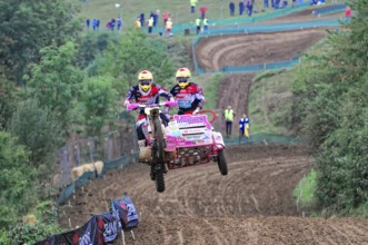 Motocross, Rudersberg, Baden-Württemberg, Germany, Europe, motocross team with sidecar takes off