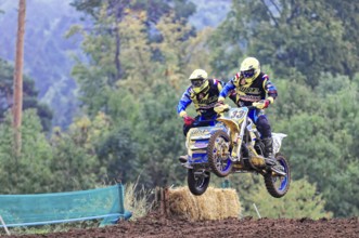 Motocross, Rudersberg, Baden-Württemberg, Germany, Europe, Motocross duo with sidecar jumps into
