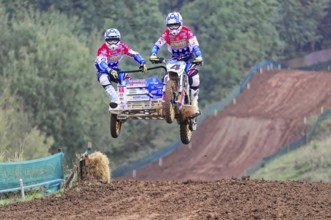 Motocross, Rudersberg, Baden-Württemberg, Germany, Europe, Motocross team with sidecar jumps over a