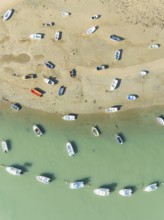 Fishing boats at low tide at the fishing village of Sancti Petri. In the marshland of the Bahía de