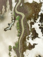 Marshland at low tide. Nature Reserve La Breña y Marismas del Barbate. Aerial view. Drone shot.
