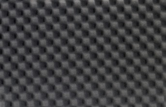 Full frame background of black foam plastics