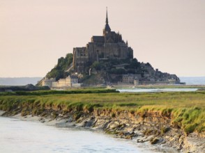 The Mont Saint Michel Abbey in Lower Normandy France at evening time