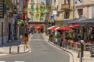 Impression of Orange, a commune in the Provence region in southeastern France at summer time
