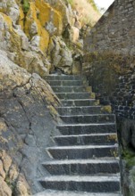 Stairs around the Mont Saint Michel Abbey in Lower Normandy France at evening time