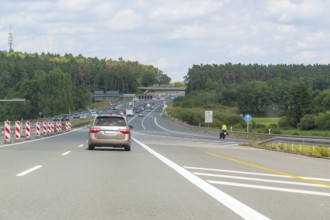 Scenery on a german motorway with road construction zone in sunny summer ambiance