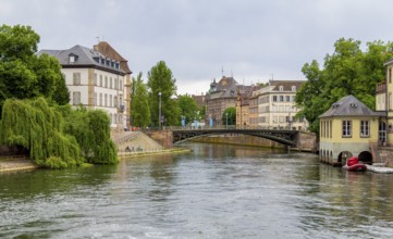 Idyllic waterside impression of Strasbourg, a city at the Alsace region in France