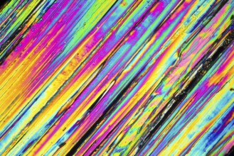 Microscopic shot of urea micro crystals in polarized light