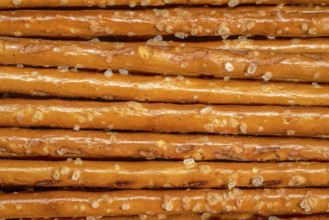 Closeup of some salt sticks in light back