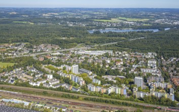 Aerial view, residential area district Hassels with high-rise buildings and view to Unterbacher