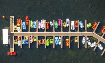 Aerial view, colourful pedal boats at a jetty on the Unterbacher See at the campsite north,