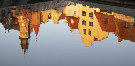 Waterfront promenade with reflection at sunrise in the Old Town, Motlawa River, Gdansk, Gdansk,