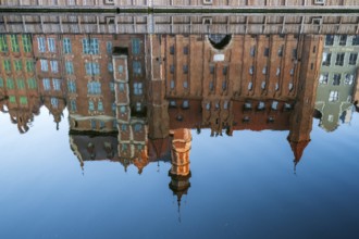 Waterfront promenade with reflection at sunrise in the Old Town, Motlawa River, Gdansk, Gdansk,
