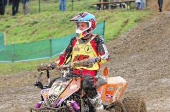 Motocross, Rudersberg, Baden-Württemberg, Germany, Europe, Motocross quad rider on muddy track with