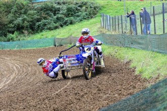 Motocross, Rudersberg, Baden-Württemberg, Germany, Europe, Rider with sidecar in the bend,