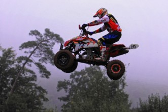 Motocross, Rudersberg, Baden-Württemberg, Germany, Europe, Motocross quad flies through the air,