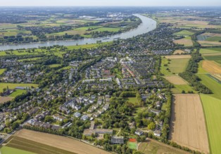 Aerial view, residential area district Wittlaer at the river Rhine, surrounded by meadows and