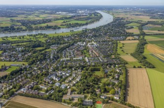 Aerial view, residential area district Wittlaer at the river Rhine, surrounded by meadows and