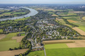 Aerial view, residential area district Wittlaer at the river Rhine, surrounded by meadows and