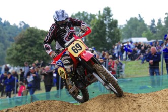 Motocross, Rudersberg, Baden-Württemberg, Germany, Europe, A motocross rider navigates a sandy bend