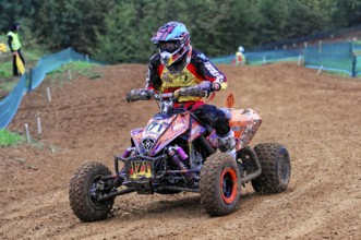 Motocross, Rudersberg, Baden-Württemberg, Germany, Europe, A quad rider masters the bend in the