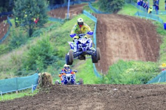 Motocross, Rudersberg, Baden-Württemberg, Germany, Europe, A quad bike rider jumps into the air on