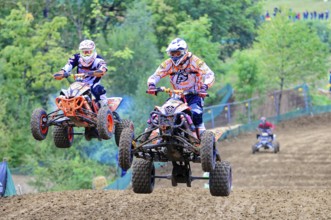 Motocross, Rudersberg, Baden-Württemberg, Germany, Europe, Two quad bikers jump side by side over a