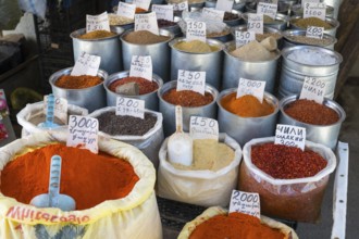 Various spices in metal containers and bags with price tags at a market, Gyumri, Gyumri, Gyumri,