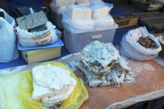 Various cheeses and walnuts for sale at a market stall, Gyumri, Gyumri, Shirak province, Armenia