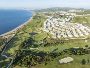 The La Hacienda Links Golf Resort at the Mediterranean Sea with the Rock of Gibraltar (British) in