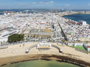 The town of Cádiz with the old quarter in the foreground. Prominent the Caleta beach and the old