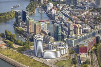 Aerial view, Media harbour on the river Rhine, construction site with construction crane and new