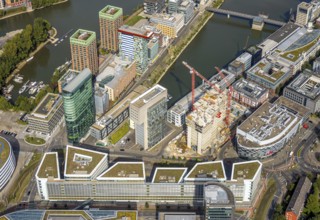 Aerial view, Media harbour on the river Rhine, construction site with construction crane and new