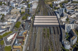 Aerial view, central station Hbf, covered platforms and tracks, city centre, Düsseldorf, Ruhr area,