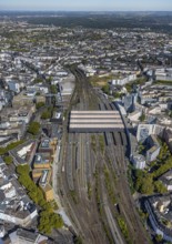 Aerial view, central station Hbf, covered platforms and tracks, city centre, Düsseldorf, Ruhr area,