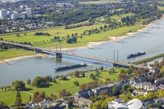 Aerial view, Theodor-Heuss-Bridge and inland navigation on the river Rhine, in front Rheinpark