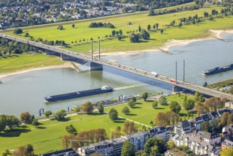 Aerial view, Theodor-Heuss-Bridge and inland navigation on the river Rhine, in front Rheinpark
