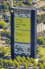 Aerial view, ARAG high-rise office building, slogan We celebrate the law and 90 years of ARAG,